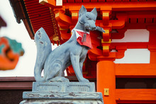 Fox Stone Statue At Fushimi Inari Shrine (Fushimi Inari Taisha) Temple In Japan