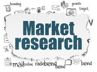 marketing concept: market research on torn paper background