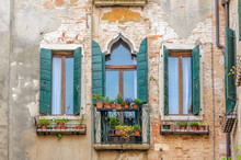 Beautiful Window Decorated With Flowers In Italy