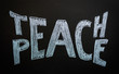 Teach peace written on a chalkboard. Peace concept