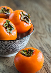 Bowl of fresh persimmons