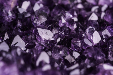 amethyst geode on black background. beautiful natural crystals gemstone. extreme close up macro shot