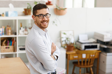 Wall Mural - Young man in offfice