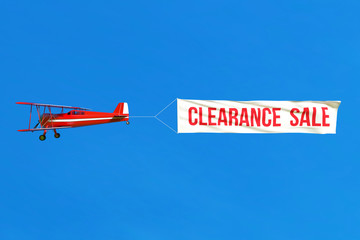 flying airplane and sale banner on blue sky. 3d illustration