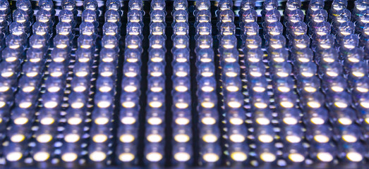 Wall Mural - Selective focus at low position of led diode panel in violet tone