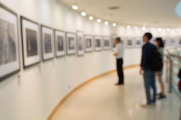 People Watching Photo in Art Gallery