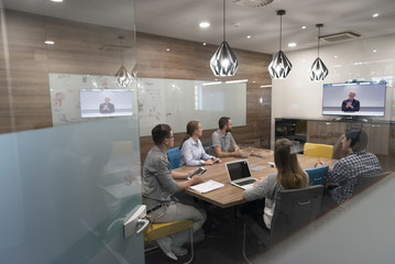 start up business people group attending videoconference call
