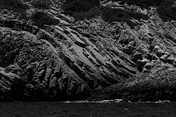  Mediterranean Sea. Crete. Greece. The cliffs of the peninsula of Kalydon. Black and white.