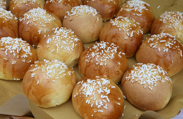 Wall Mural - tasty desserts with grains of sugar for sale in bakery