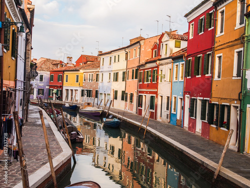 colorful street of burano island in venice, italy Poster