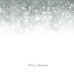 Wall Mural - christmas card with bright silver bokeh background