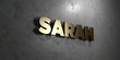 Sarah - Gold sign mounted on glossy marble wall  - 3D rendered royalty free stock illustration. This image can be used for an online website banner ad or a print postcard.