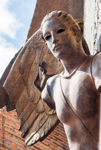 Fotografie, Obraz Rome, Italy - September 10, 2012: Angel from gate of basilica Sa