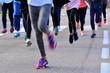 © liberowolf - Group of runners during a race cross-country road; motion blur to highlight the speed effect