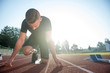 © FS-Stock - Athletic man on track starting to run. Healthy fitness concept with active lifestyle.