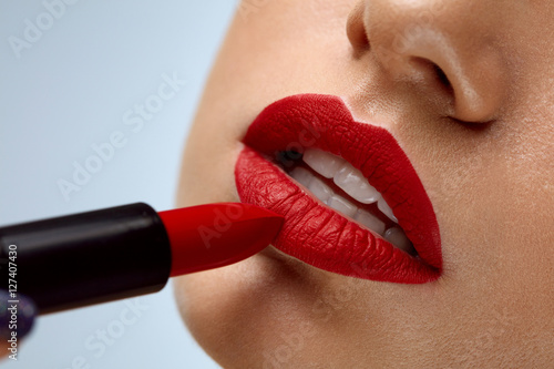 Fotografie, Obraz Red Lipstick. Closeup Of Woman Face With Bright Lips Makeup