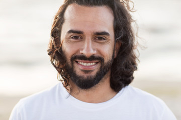 close up of happy smiling middle aged man face