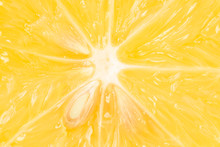 Extreme Close Up Of A Half Sliced Lemon