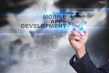 businessman is drawing on virtual screen. mobile apps development concept