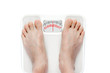 © ronniechua - Feet on Mechanical Bathroom Scale With OVERWEIGHT on Screen.  Isolated on White