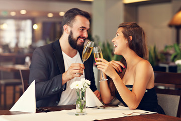 Romantic couple dating in restaurant