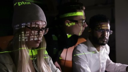 Group of hacker using computer code in dark. HD.