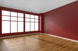 © alexus - Empty room with parquet floor, red textured walls and big window