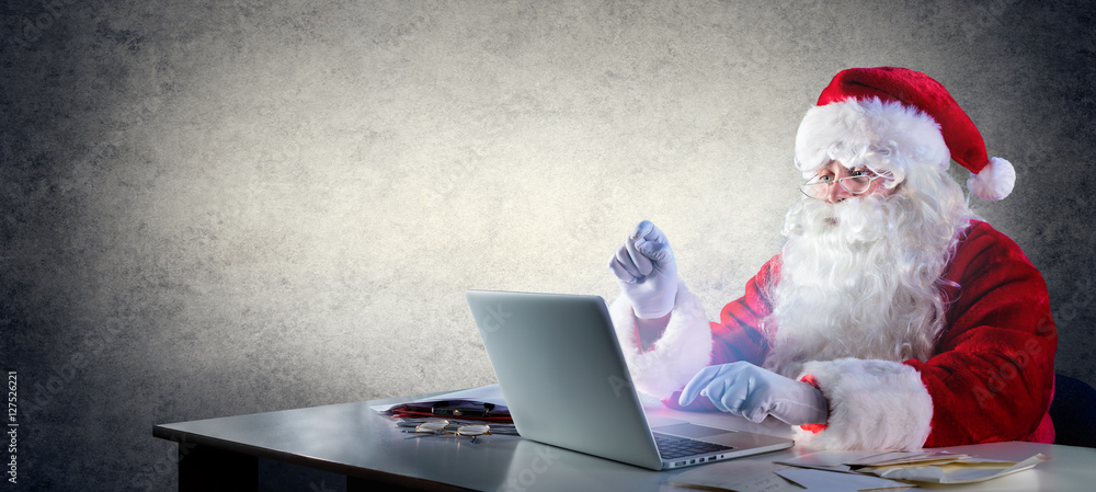 Santa Using Printer Photo Stock Santa Claus Writing With Laptop | Adobe Stock