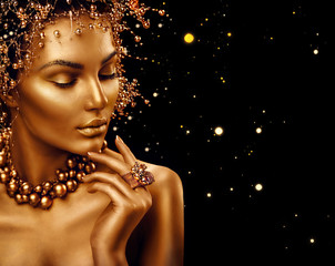 Wall Mural - beauty fashion model girl with golden skin, makeup and hairstyle isolated on black background