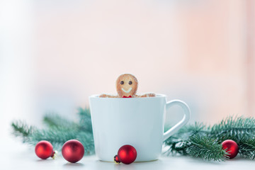 gingerbread man with cup and christmas