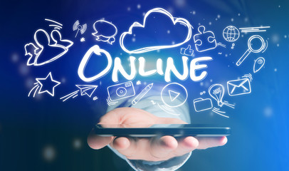 Concept of man holding smartphone with online icon around