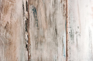 Vintage wood background with peeling paint.