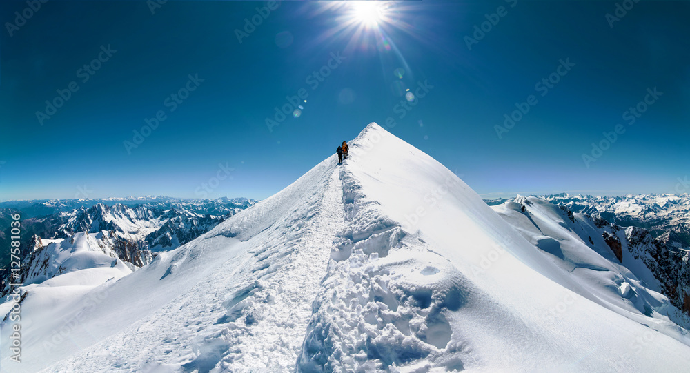 climbers approach the mountain top - obrazy, fototapety, plakaty 