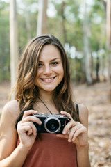 Wall Mural - Girl Taking Pictures Outdoors Concept