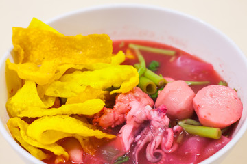 Rice Noodles Seafood   with  fish ball in red soup (Yen Ta Fo)