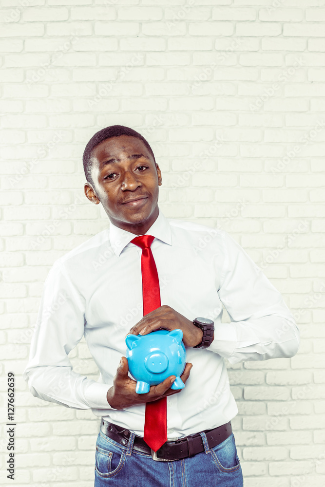 businness black man with piggy bank Stock Photo | Adobe Stock