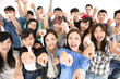 © Tom Wang - top view of happy young group hand pointing to camera