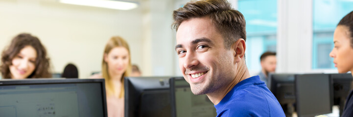 Man having computer classes at univeristy