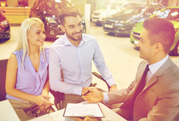 Poster - happy couple with car dealer in auto show or salon