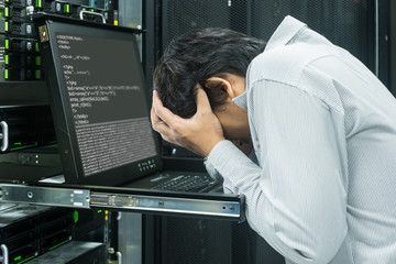 System administrator serious working in data center