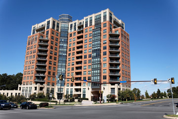 Wall Mural - Apartment condo building. Blue sky. Horizontal.