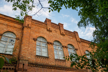 Wall Mural - Old red brick building of Chizhovsky barracks in Voronezh