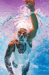 Female swimmer with tattoos