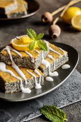 Wall Mural - Delicious poppy seeds cake topped with lemon glaze