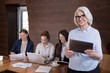 © Viacheslav Yakobchuk - Elegant boss posing with her colleagues