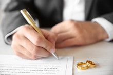 Man Signing Marriage Contract, Closeup
