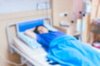 © Art_Photo - Patient on bed in room hospital blur background