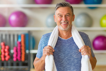 Senior man in health club
