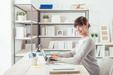 Poster - Smiling businesswoman in her office