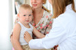 © rogerphoto - Doctor examining a child  patient by stethoscope